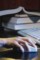 photo of hand on mouse